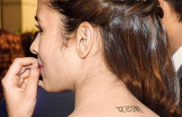 Alia Bhatt : She has the words ‘Pataka’ inscribed on the back of her neck. Need we say more on how we agree with that tattoo?