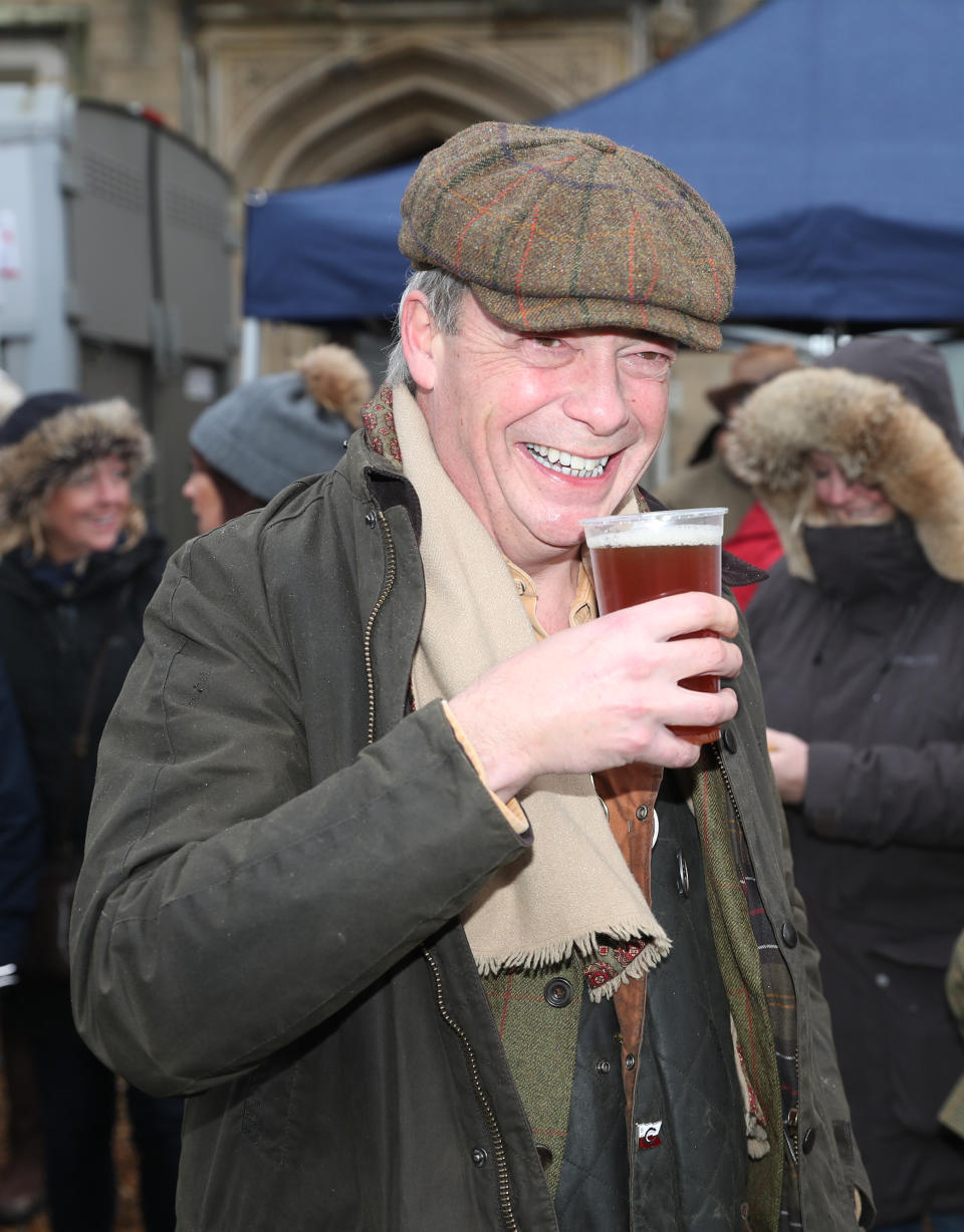 Nigel Farage enjoys a pint before the Old Surrey Burstow and West Kent Boxing Day Hunt in Edenbridge, Kent.