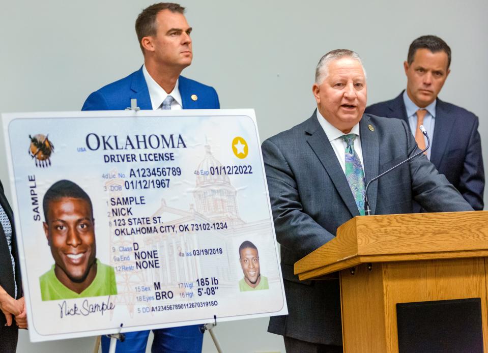 John Scully, pictured here during a 2019 press conference with Oklahoma Gov. Kevin Stitt, is retiring as the commissioner of the Department of Public Safety.