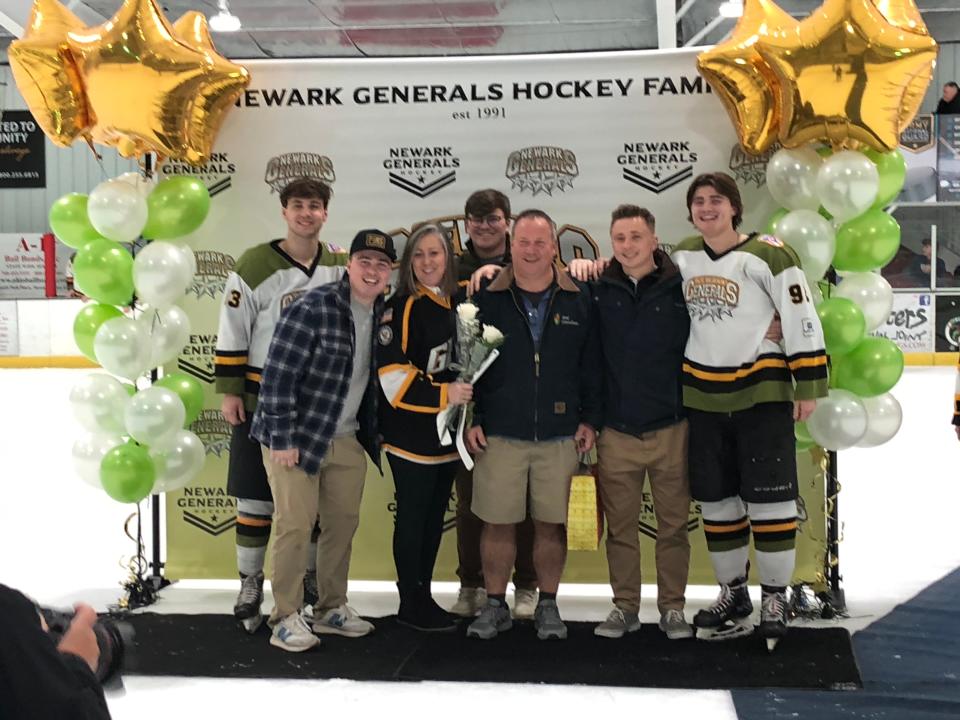 The Chaykowski family poses with twins Matt (left) and Mikey (right) after they were honored on Senior Night for the Newark Generals on Thursday at Reese Ice Arena.
