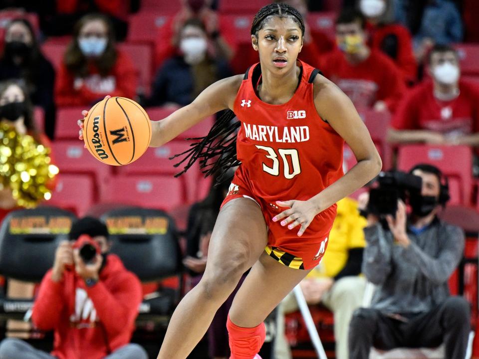 Angel Reese #30 of the Maryland Terrapins handles the ball against the Indiana Hoosiers at Xfinity Center on February 25, 2022