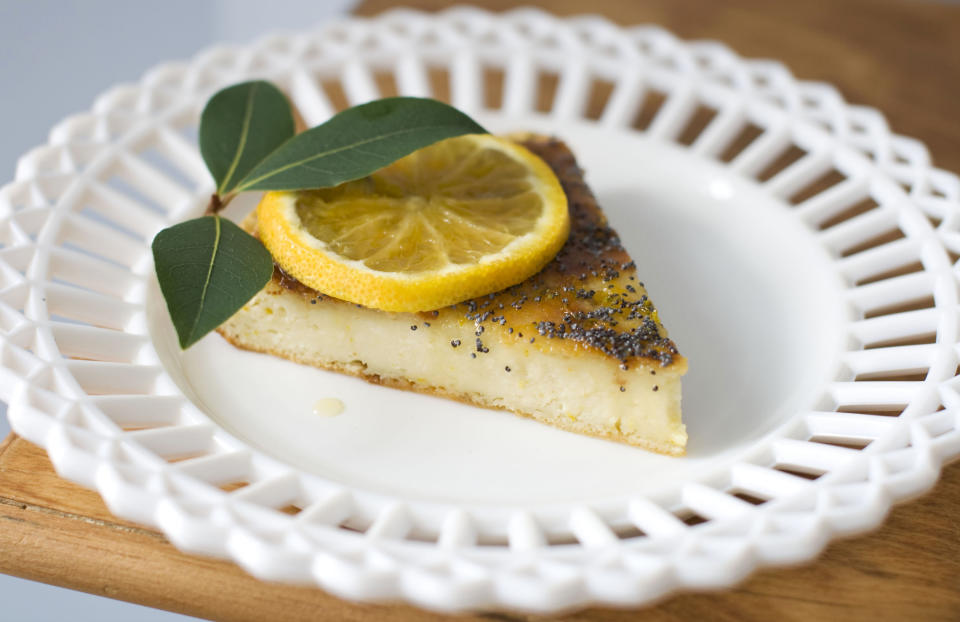 n this image taken on November 5, 2012, a slice of Roman cheesecake with orange-scented honey is shown served on a plate in Concord, N.H. (AP Photo/Matthew Mead)