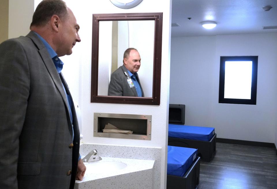 Valleywise Health Behavioral Health Services Senior Vice President Gene Cavallo looks at empty psychiatric beds at the Maryvale facility on March 1, 2023. The beds are empty due to staffing shortages.