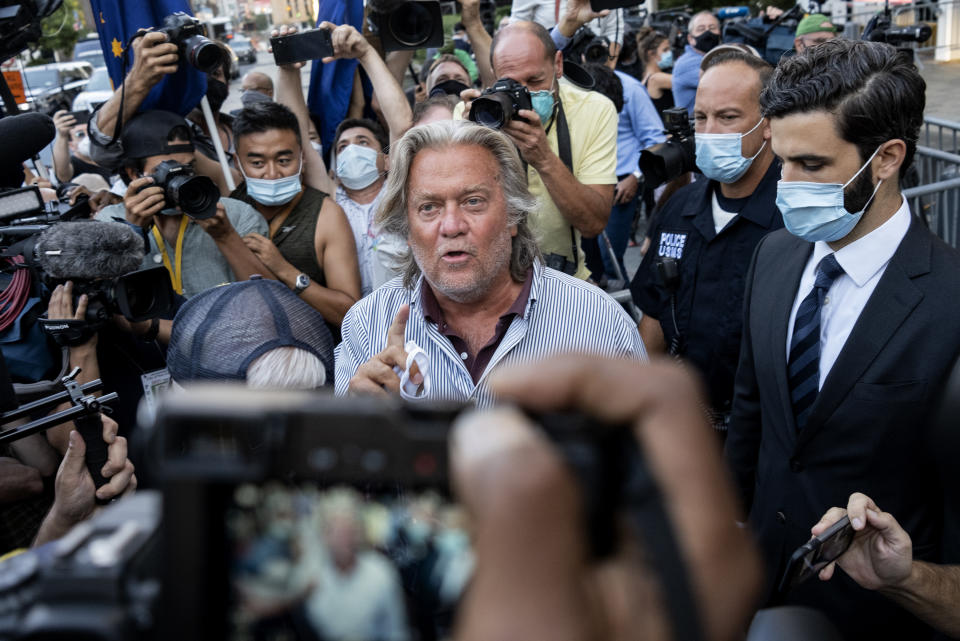 President Donald Trump's former chief strategist Steve Bannon leaves federal court, Thursday, Aug. 20, 2020, after pleading not guilty to charges that he ripped off donors to an online fundraising scheme to build a southern border wall. (AP Photo/Craig Ruttle)