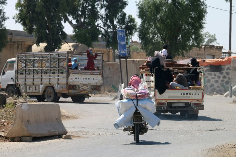 Syrians fleeing the government's offensive in Daraa province seek refuge in the village of Al-Rafid near the armistice line with Israeli forces in the occupied Golan Heights on June 27, 2018