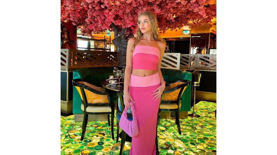 A photo of Princess Andre in a pink co-ord