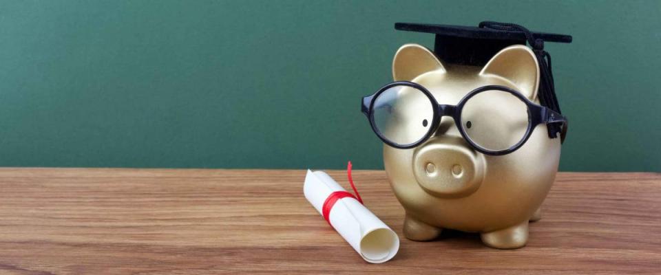 Piggy bank with grad cap