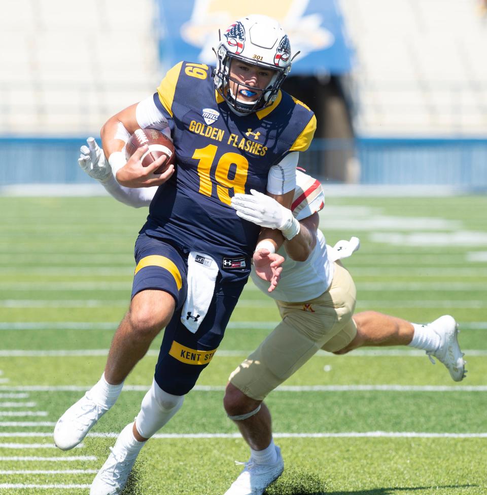 Kent State quarterback Collin Schlee scores a touchdown during last season's victory over VMI at Dix Stadium.