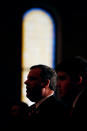 New Jersey Gov. Chris Christie is silhouetted as he attends a prayer service with his family in celebration of his inauguration at the New Hope Baptist Church on Tuesday, Jan. 21, 2014 in Newark. The celebrations to mark the start of Christie's second term could be tempered by investigations into traffic tie-ups that appear to have been ordered by his staff for political retribution and an allegation that his administration linked Superstorm Sandy aid to approval for a real estate project. (AP Photo/Rich Schultz)