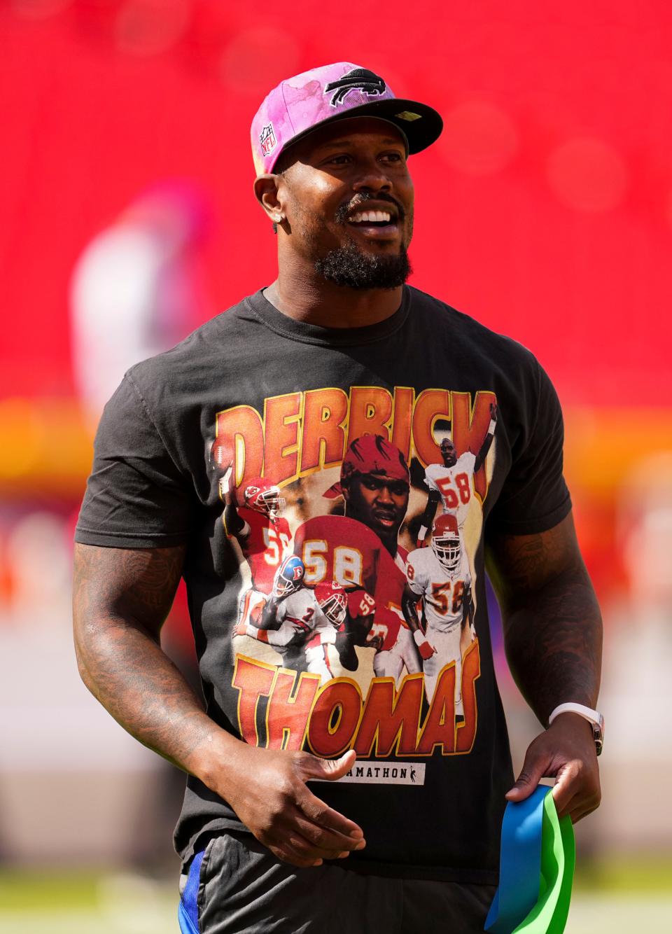 Von Miller wears a shirt featuring former Kansas City Chiefs linebacker Derrick Thomas prior to Sunday's game at Arrowhead Stadium.