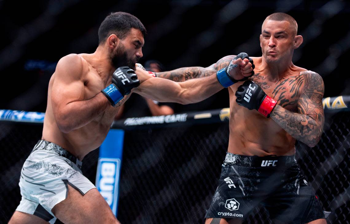 Dustin Poirier of the United States fights against Benoit Saint Denis of France during their lightweight title match during the UFC 299 event at the Kaseya Center on Saturday, March 9, 2024, in downtown Miami, Fla.