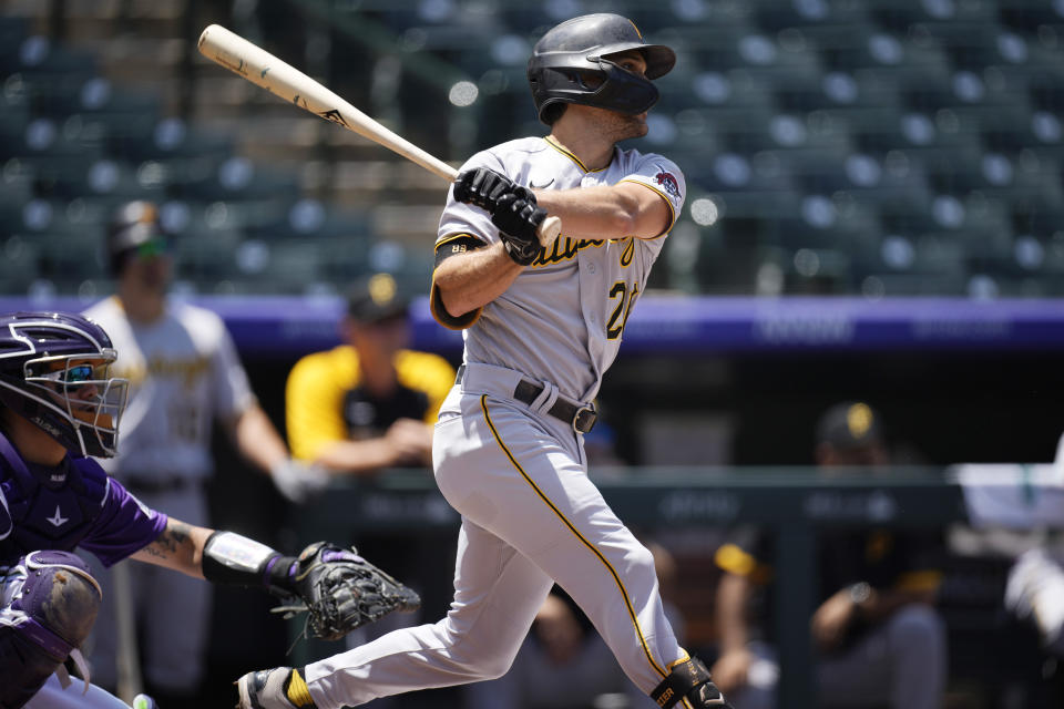 Pittsburgh Pirates' Adam Frazier triples off Colorado Rockies starting pitcher Jon Gray in the first inning of a baseball game Wednesday, June 30, 2021, in Denver. (AP Photo/David Zalubowski)