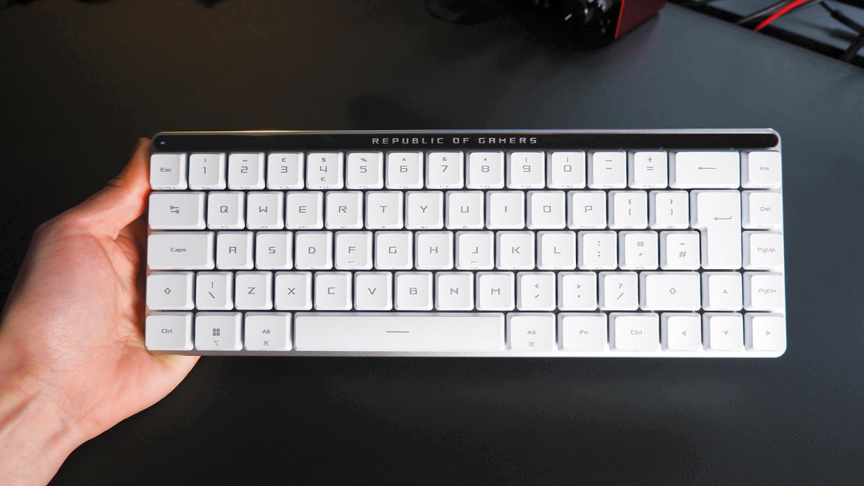  The ROG Falchion RX gaming keyboard in white set up on a desk. . 