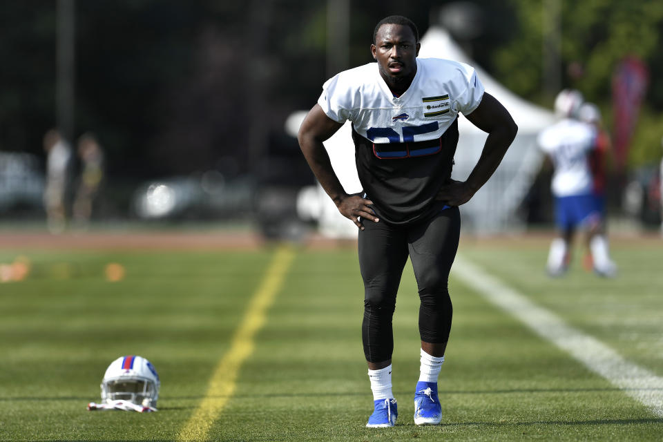 FILE - In this July 25, 2019 file photo, Buffalo Bills running back LeSean McCoy stretches during practice at the NFL football team's training camp in Pittsford, N.Y. A person with direct knowledge of the decision has confirmed to The Associated Press the Buffalo Bills have released veteran running back LeSean McCoy in a stunning move made as NFL teams set their 53-player rosters. The person spoke to The AP on the condition of anonymity on Saturday, Aug. 31, because the Bills have not announced the decision. ESPN.com first reported McCoy being cut. (AP Photo/Adrian Kraus, File)