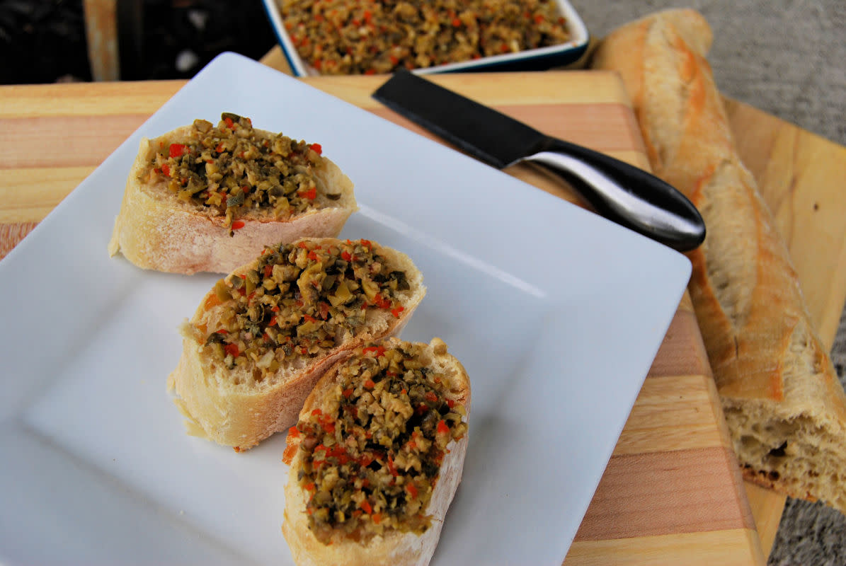 <p>Krista Marshall</p><p>The food processor does all the work for this tasty spread perfect for a crusty baguette.</p><p><strong>Get the recipe: <a href="https://parade.com/881793/kristamarshall/olive-caper-spread-recipe/" rel="nofollow noopener" target="_blank" data-ylk="slk:Olive Caper Spread;elm:context_link;itc:0;sec:content-canvas" class="link rapid-noclick-resp">Olive Caper Spread</a></strong></p>