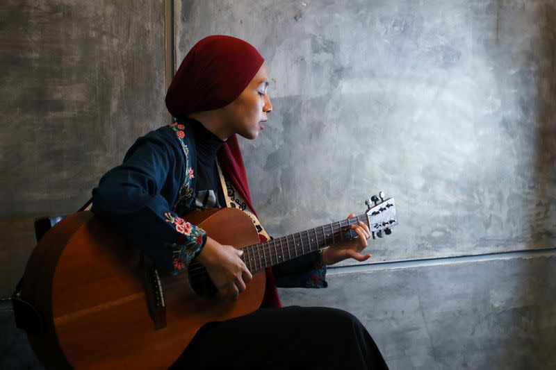 Malaysian artist Wani Ardy sings during an interview with Reuters, in Shah Alam