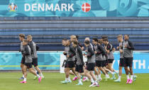 Players exercise at the training ground during a training session of Denmark's national team in Helsingor, Denmark, Monday, June 14, 2021. It is the first training of the Danish team since the Euro championship soccer match against Finland when Christian Eriksen collapsed last Saturday. (AP Photo/Martin Meissner)