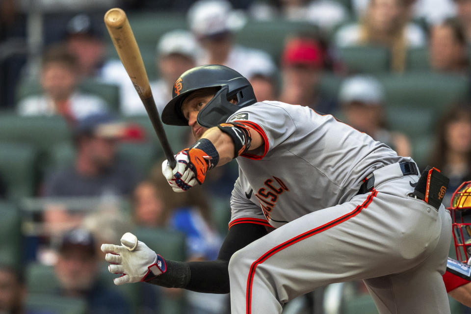 San Francisco Giants' Nick Ahmed grounds out during the fifth inning of a baseball game against the Atlanta Braves, Thursday, July 4, 2024, in Atlanta. (AP Photo/Jason Allen)