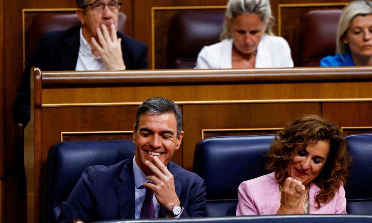 <span>The Spanish PM Pedro Sánchez and first deputy PM María Jesús Montero in parliament on Thursday, where the new law was approved by 177 votes to 172.</span><span>Photograph: Susana Vera/Reuters</span>