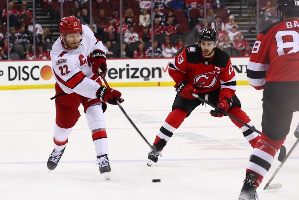 Carolina Hurricanes defenseman Brett Pesce (22) shoots the puck against the New Jersey Devils during the third period in game four of the second round of the 2023 Stanley Cup Playoffs at Prudential Center.