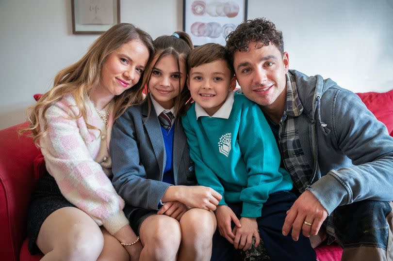 Katie Griffiths as Chlo Charles, Scarlett Thomas as Izzie Charles, Teddy Thomas as Tommy Charles and Adam Thomas as Donte Charles -Credit:BBC/Wall To Wall/Rope Ladder Fiction/David Gennard