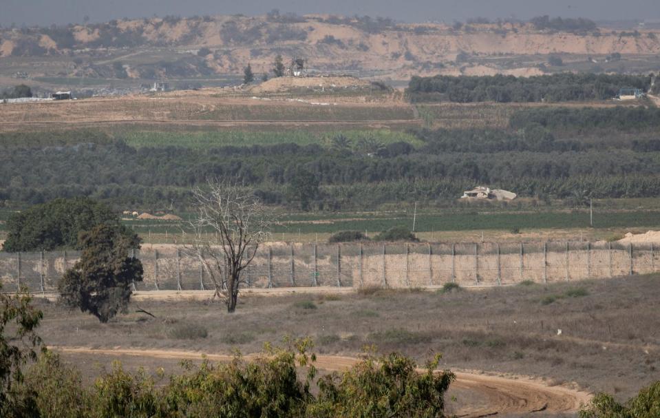 A fence on Israel’s border with Gaza is seen on Nov. 24, 2023, during a temporary humanitarian truce between Hamas and Israel. <a href="https://www.gettyimages.com/detail/news-photo/this-photo-shows-a-fence-seen-from-israels-border-with-gaza-news-photo/1801721901?adppopup=true" rel="nofollow noopener" target="_blank" data-ylk="slk:Chen Junqing/Xinhua via Getty Images;elm:context_link;itc:0;sec:content-canvas" class="link ">Chen Junqing/Xinhua via Getty Images</a>