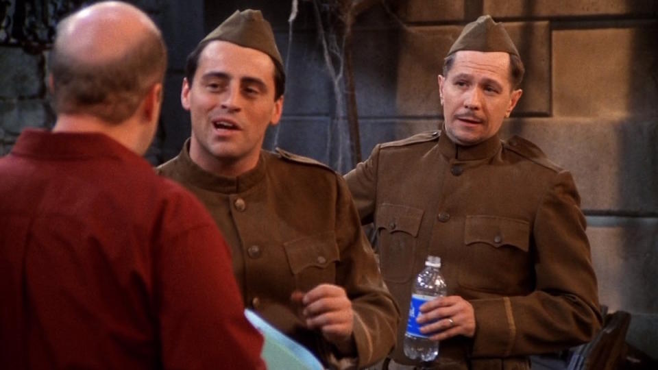 Gary Oldman guest stars as an actor in a war drama while holding a water bottle in Friends