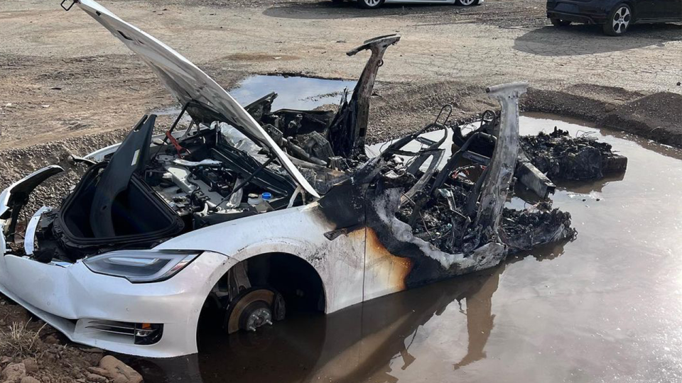 A Tesla on fire in a California wrecking yard kept reigniting after firefighters worked to extinguish it.