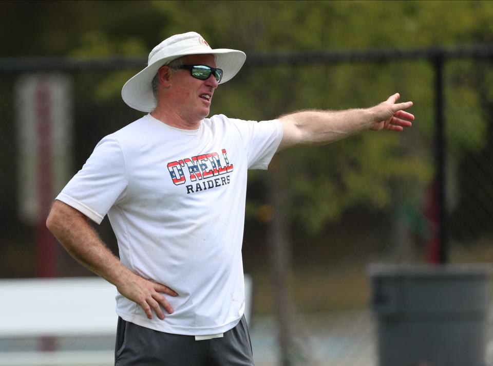 O'Neill head coach Dave Moskowitz leads a drill during their season opening practice at James I. O'Neill High School in Highland Falls on Saturday, August 20, 2022.