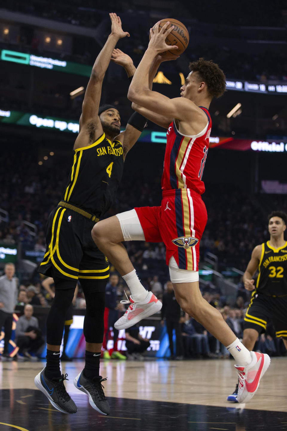 New Orleans Pelicans guard Dyson Daniels (11) drives to the basket against Golden State Warriors guard Moses Moody (4) during the first quarter of an NBA basketball game, Wednesday, Jan. 10, 2024, in San Francisco. (AP Photo/D. Ross Cameron)