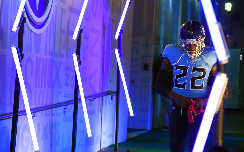 Tennessee Titans running back Derrick Henry finished in the top 10 in rushing yards and rushing touchdowns this season, despite missing nine games. (Christopher Hanewinckel/USA TODAY Sports)