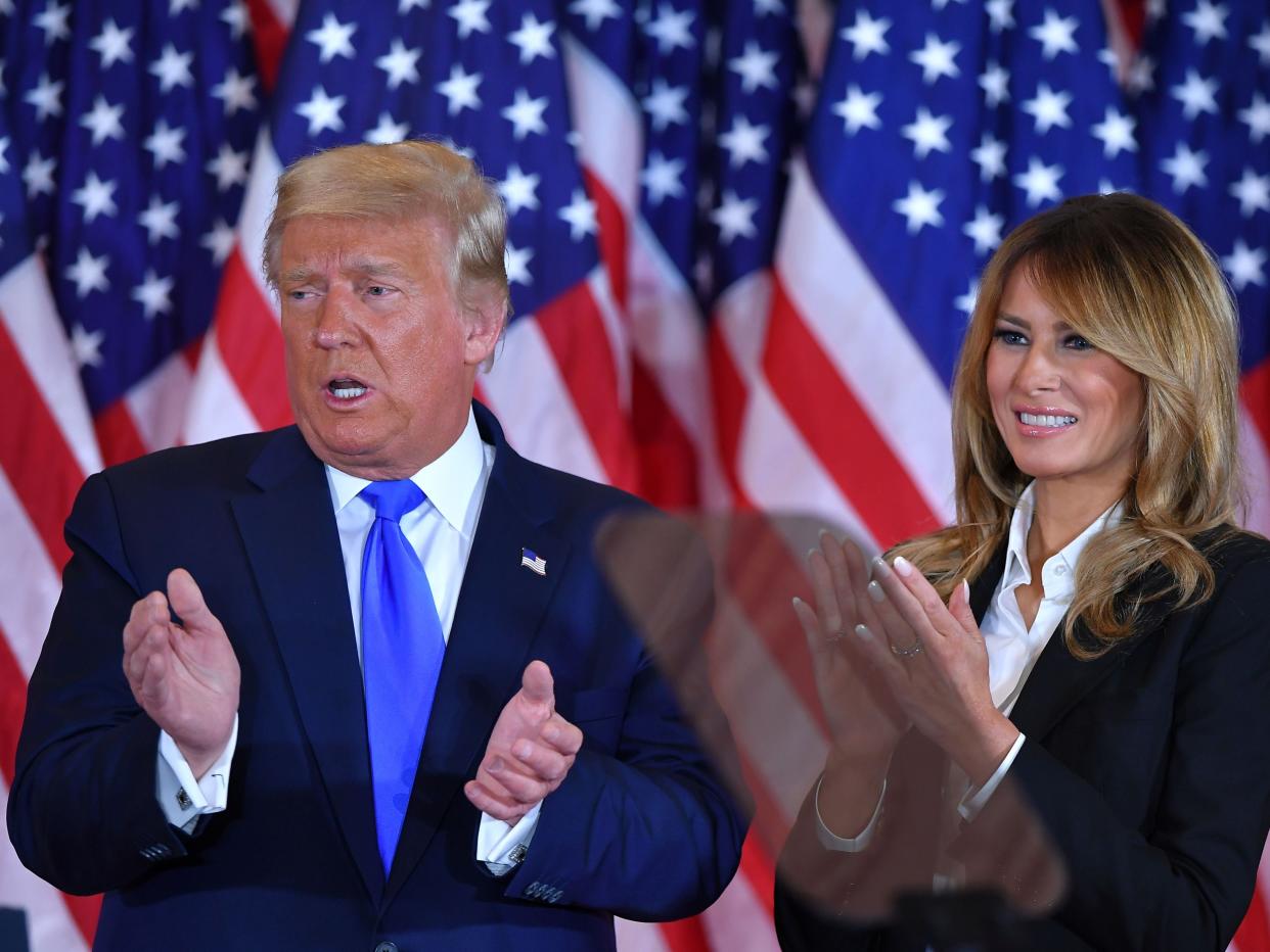 Donald and Melania Trump (AFP via Getty Images)