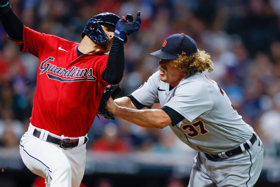 Detroit Tigers relief pitcher Andrew Chafin (37) tags out Cleveland Guardians' Andres Gimenez during the sixth inning Friday, July 15, 2022, at Progressive Field in Cleveland.