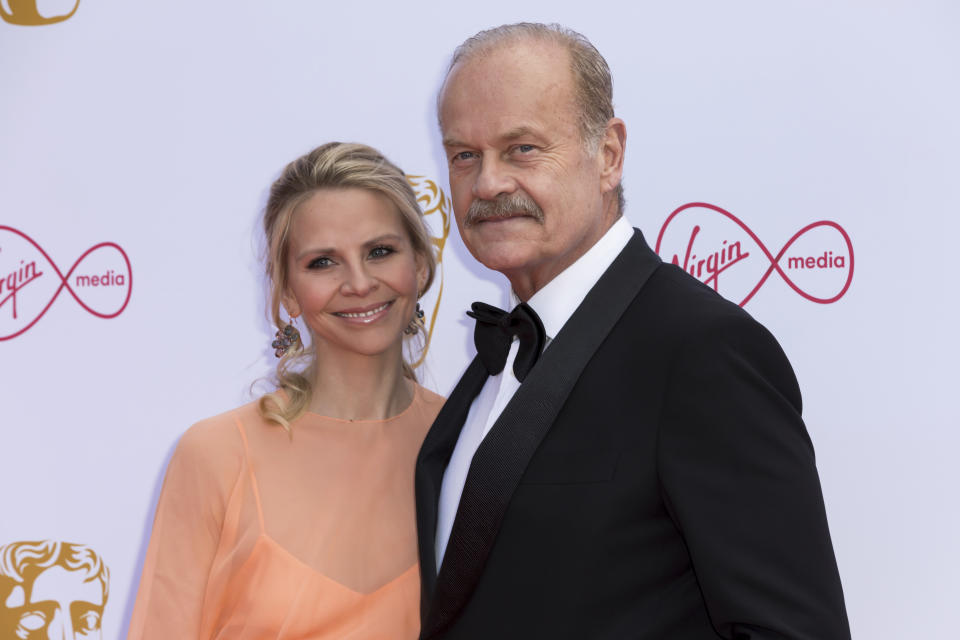 Actor Kelsey Grammer, and partner actress Kayte Walsh pose for photographers on arrival at the 2019 BAFTA Television Awards in London, Sunday, May 12, 2019.(Photo by Grant Pollard/Invision/AP)