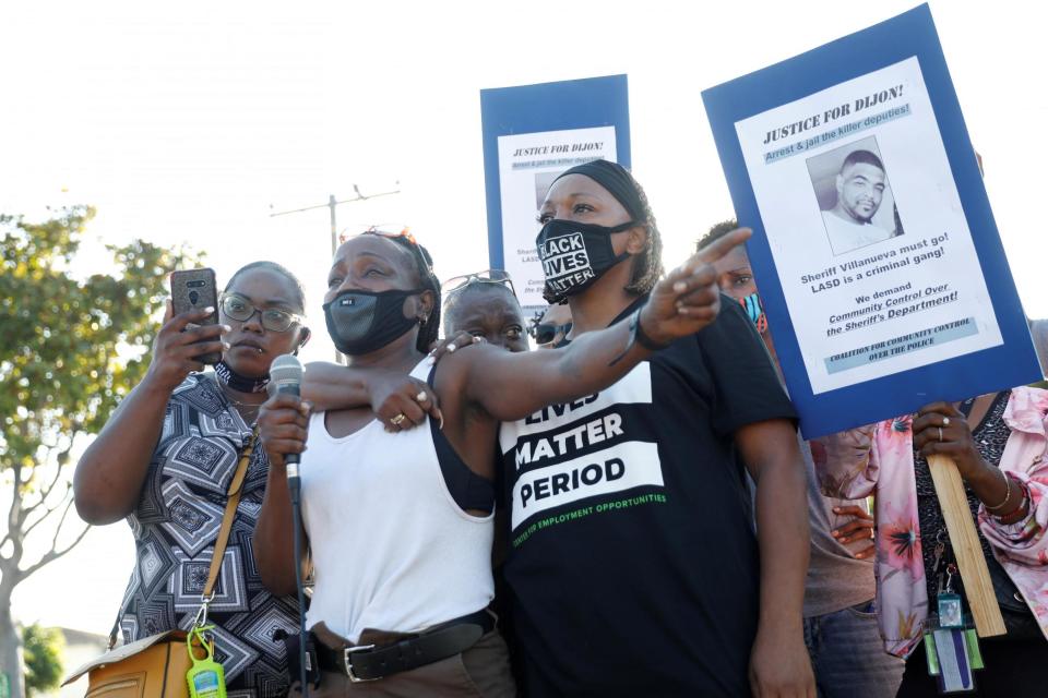 Sheila Jackson (2nd L), aunt of Dijon Kizzee speaks during the protests (REUTERS)