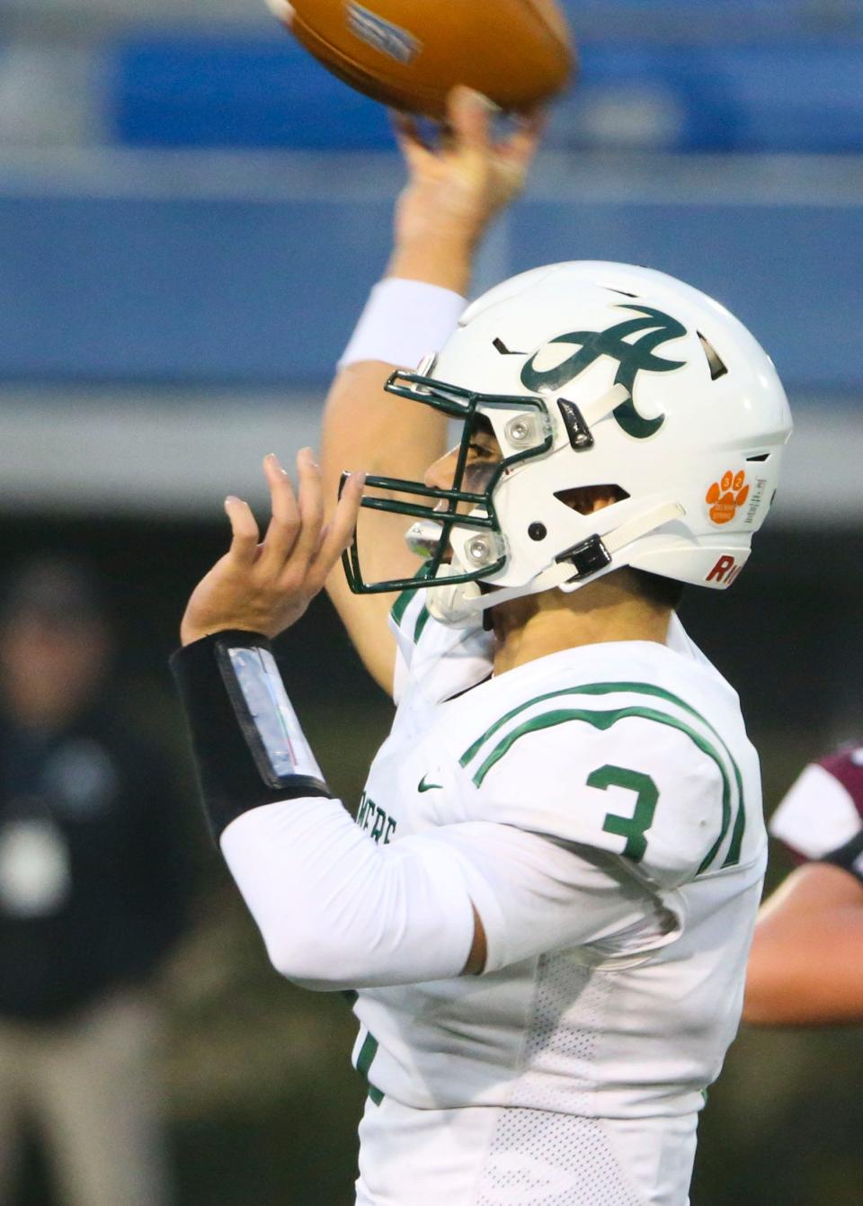 Archmere's Miles Kempski throws deep for a touchdown to get the Auks on the board and within 21-7 in the third quarter of Caravel's 35-13 win in the DIAA Class 2A championship at Delaware Stadium, Saturday, Dec. 2, 2023.