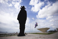 The silhouette of national hero Augusto C. Sandino towers over the Tiscapa Lagoon in Managua, Nicaragua, Thursday, June 17, 2021. In recent weeks, Nicaragua President Daniel Ortega's government has rounded up 13 opposition leaders, including four presidential challengers for the Nov. 7 elections. They face allegations ranging from money laundering to crimes against the state. (AP Photo/Miguel Andres)