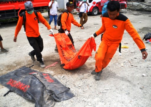 A total 2,065 bodies have been recovered since the twin disaster