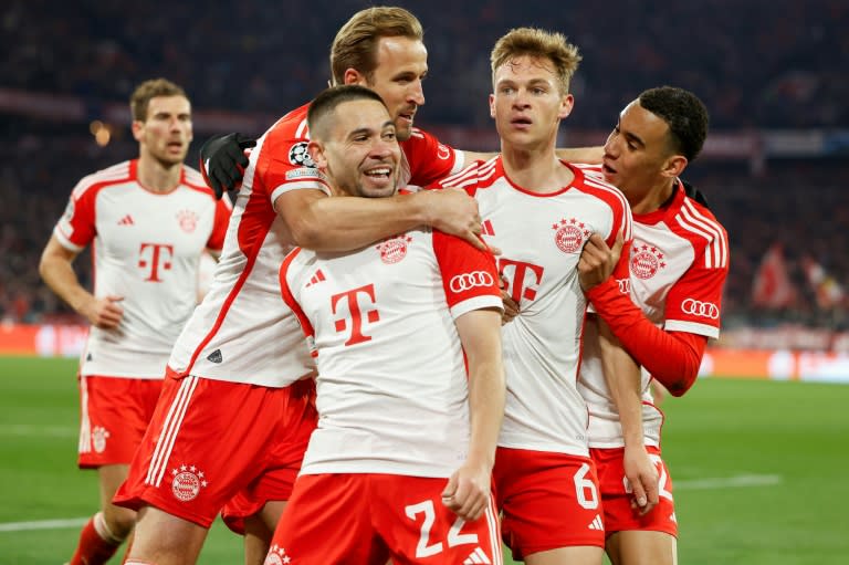 La joie des joueurs du Bayern après le but de Joshua Kimmich (N.6) contre Arsenal, en quart de finale retour de la Ligue des champions, le 17 avril 2023 à Munich (Odd ANDERSEN)