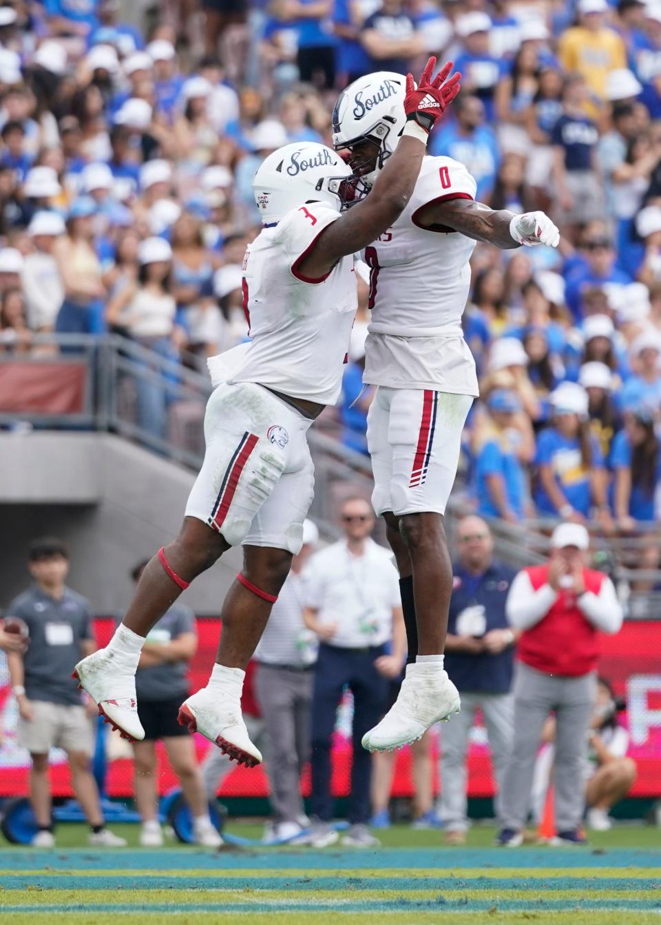 South Alabama running back La'Damian Webb (3) celebrates with wide receiver Jalen Wayne (0) after scoring a touchdown during the game against UCLA in Pasadena, Calif., on Sept. 17, 2022.