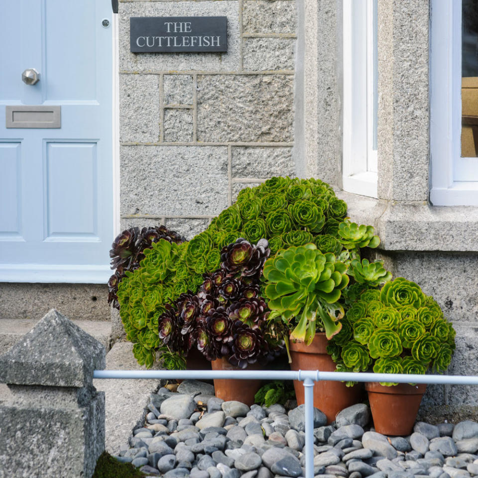 Use pebbles outside a coastal home