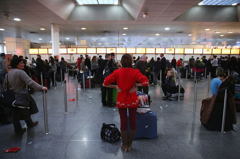 Gatwick airport passengers check in