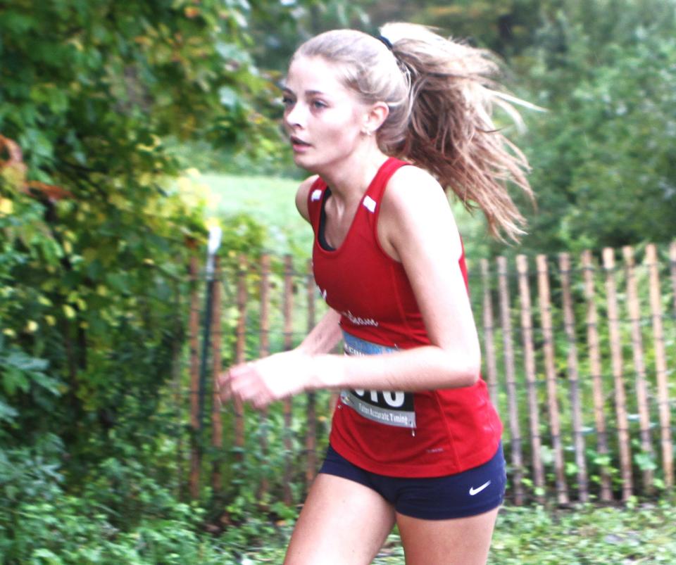 Ketcham's Abby Kowalczyk, the eventual girls winner, goes up an incline at the Dan Purdy Memorial Cross-Country Invitational Sept. 20, 2023 at Pawling High.