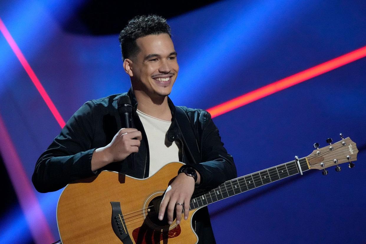 Wilmington musician Carlos Rising performing on NBC show "The Voice."