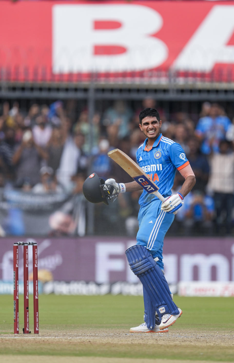 India's Shubman Gill celebrates his century during the second one day international cricket match between India and Australia in Indore, India, Sunday, Sept. 24, 2023. (AP Photo/Ajit Solanki)