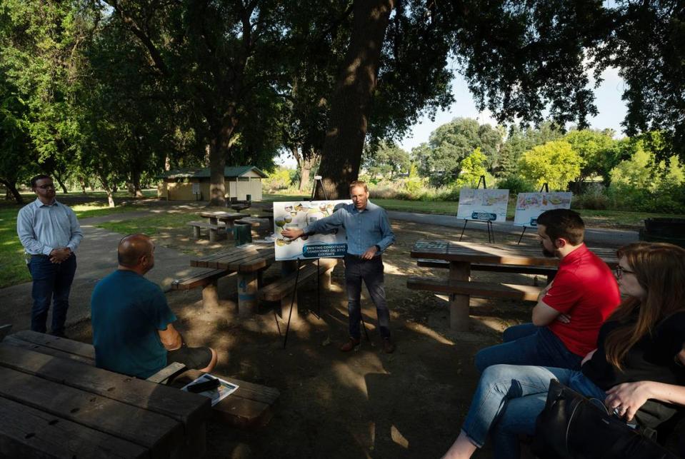 O’Dell Engineering’s Chad Kennedy describes the Tuolumne River Regional Park master plan update during a meeting in Mary Grogan Grove in Modesto, Calif., Thursday, June 7, 2023.