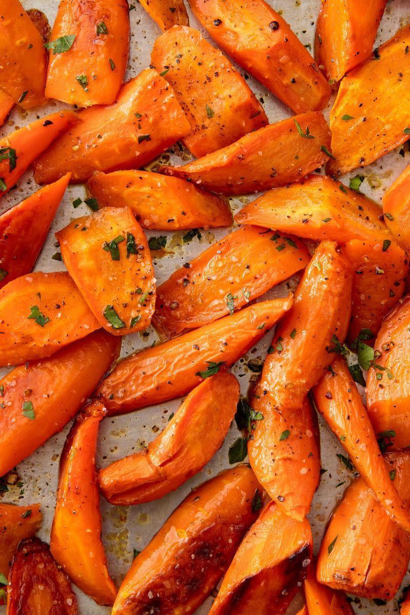 <p>Our biggest piece of advice: Don't overcrowd the pan.</p><p>Get the <a href="https://www.delish.com/uk/cooking/recipes/a29571518/oven-roasted-carrots-recipe/" rel="nofollow noopener" target="_blank" data-ylk="slk:Roasted Carrots;elm:context_link;itc:0;sec:content-canvas" class="link ">Roasted Carrots</a> recipe.</p>
