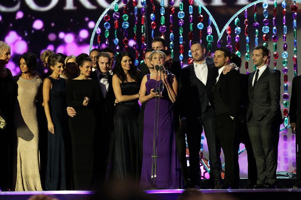 Cast and crew of Coronation Street collect the Serial Drama award on stage during the 2012 NTA Awards at the O2, Greenwich, London