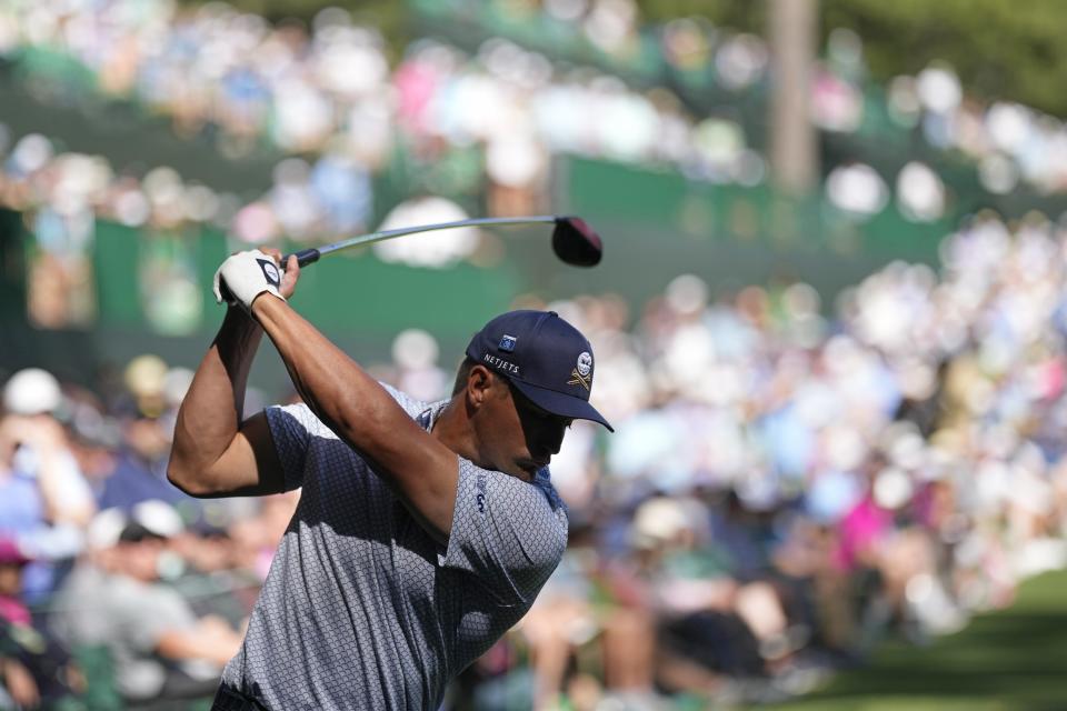 Bryson DeChambeau hits his tee shot on the 14th hole during second round at the Masters golf tournament at Augusta National Golf Club Friday, April 12, 2024, in Augusta, Ga. (AP Photo/David J. Phillip)