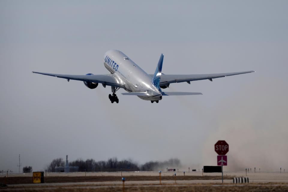 A United Airlines jet takes off Sunday, Feb. 5, 2023, in Kansas City, Missouri. (AP Photo/Charlie Riedel)